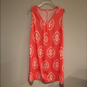 Cute coral dress in size medium. It has never been worn.